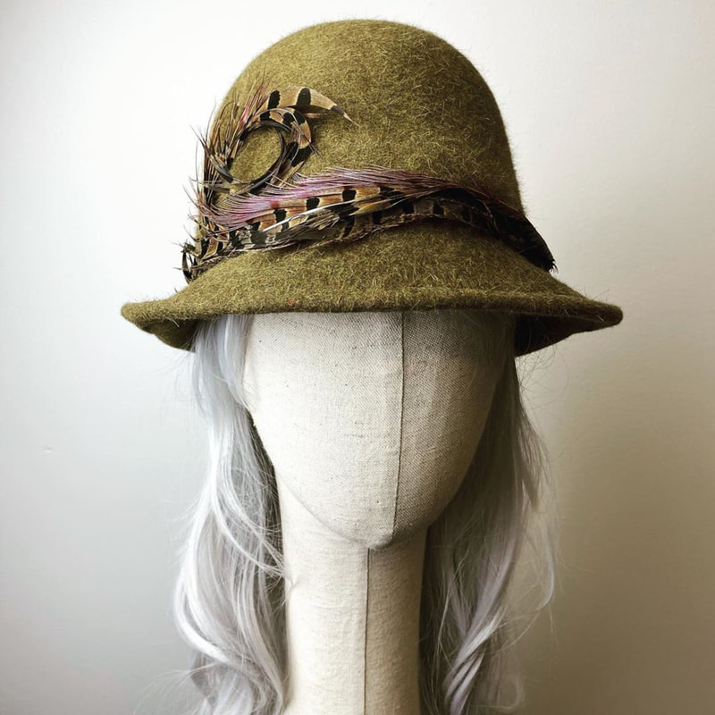 I am a textile artist and milliner who creates stitched photography, plush creatures, and soft assemblages.